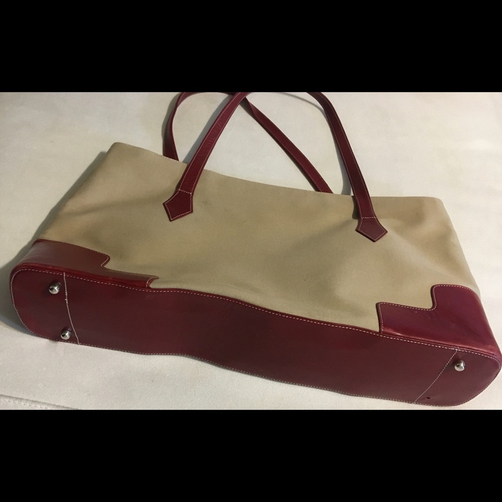Handbag.  Max Azria. BCBG. Tan canvas. Red leather.